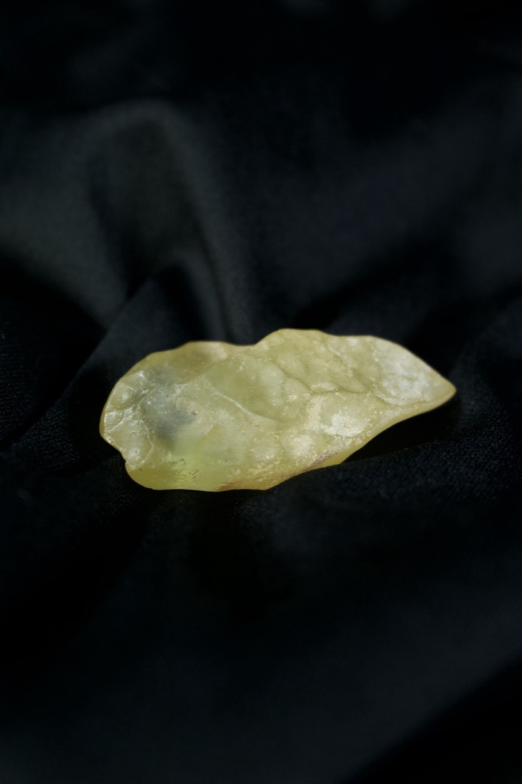 A wide, flat piece of Libyan Desert Glass